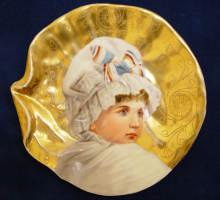 Antique china, a lovely portrait of a child.