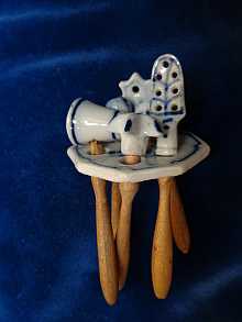 Antique support with 5 utensils made of china & wood, made about 1900.
