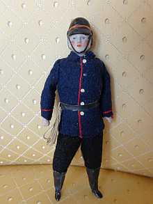 Antique dollhouse-firefighter, dated about 1910.