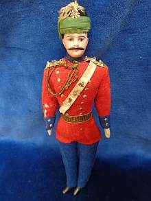 Antique dollhouse man, rare bisque head officer, dated about 1900.