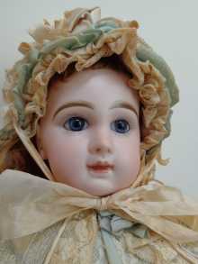 Antique French Depose tete Jumeau doll, closed mouth, dated about 1885.
