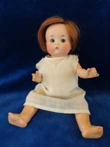 Antique doll, cute Just ME doll with closed mouth and small blue glass sleep eyes, made by Armand Marseille.