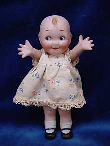 Kewpie/Googly, um 1920. 